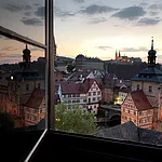 The view from the tower of the renaissance castle Geyerswörth to the episcopal town - part of the World Cultural Heritage Site - is one of the most beautiful views in town. Especially in the evening Bamberg gleams in a very special atmosphere.