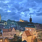 The view from the tower of the renaissance castle Geyerswörth to the episcopal town - part of the World Cultural Heritage Site - is one of the most beautiful views in town. Especially in the evening Bamberg gleams in a very special atmosphere.