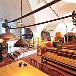 A collection of historic brewing equipment and the documentation of the production process from the malt production to the finished beer.