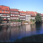 "Klein Venedig" is the former settlement of fishermen along the River Regnitz. The pretty houses, which are lined up next to each other, are charming, especially  when they are decorated and illuminated during the 'Sandkerwa' (Bamberg's famous annual fair). Some of the houses were built in the medieval times.