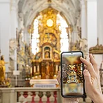Im Bamberger Stiftsladaden auf dem Michaelsberg können Audioguides für die Klosterkirche erworben werden.